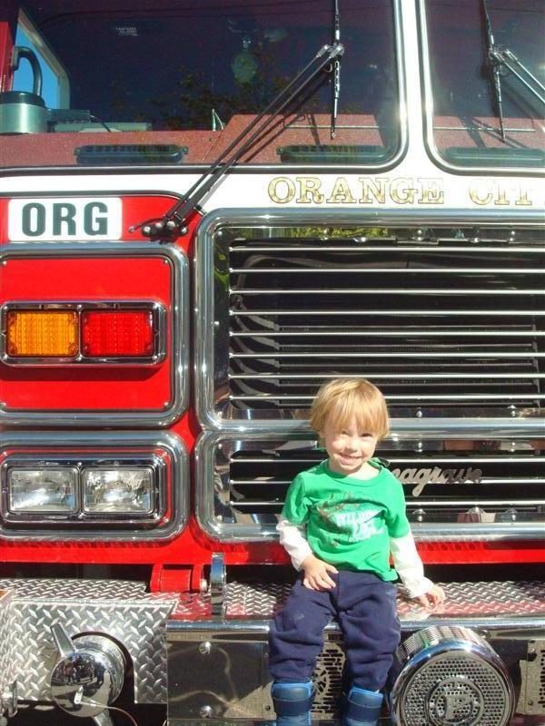 cv-preschool-toddler-on-a-fire-truck